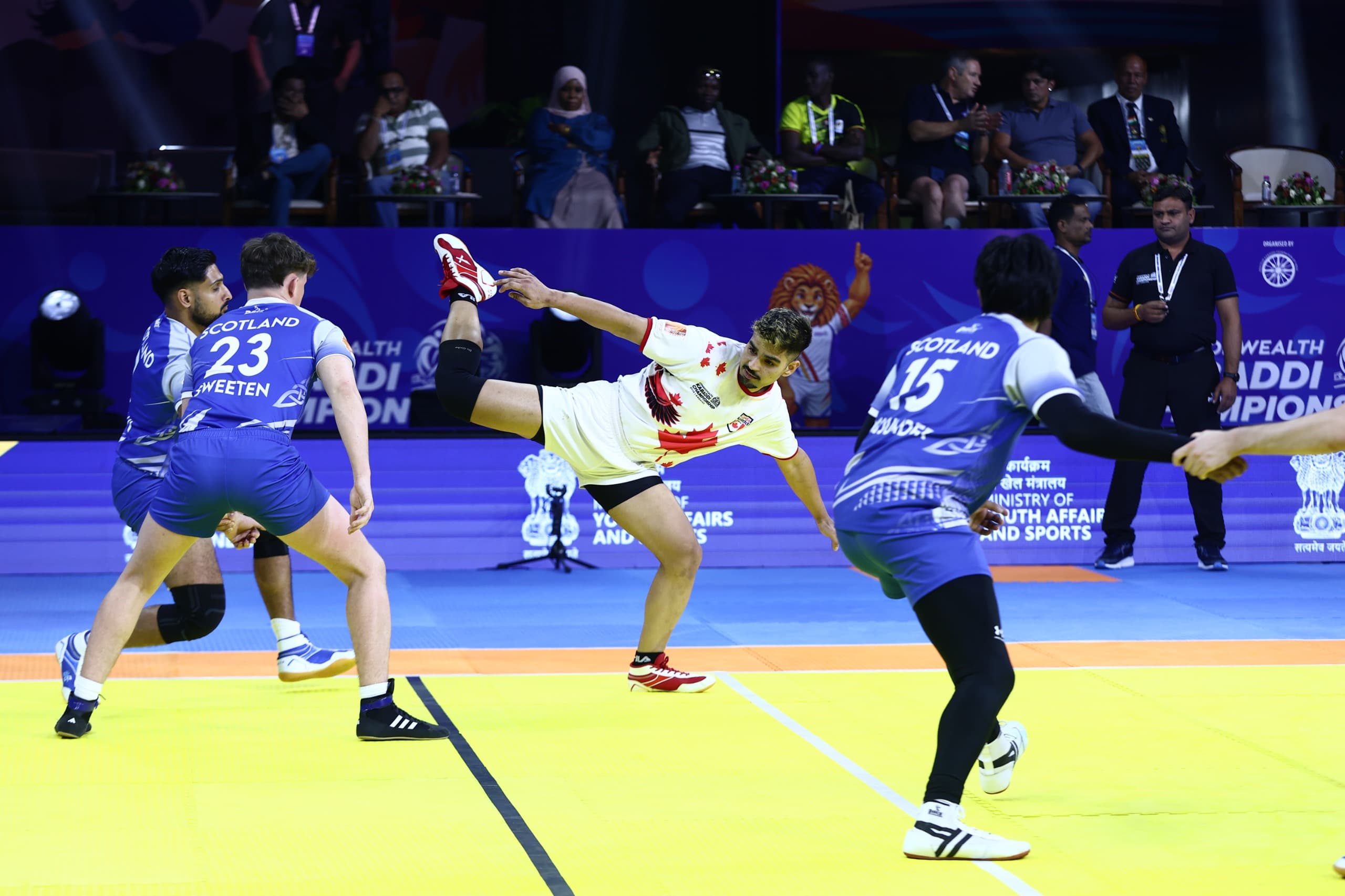 A Canada raider stretches for a touch against Scotland's men at the Commonwealth Kabaddi Championship