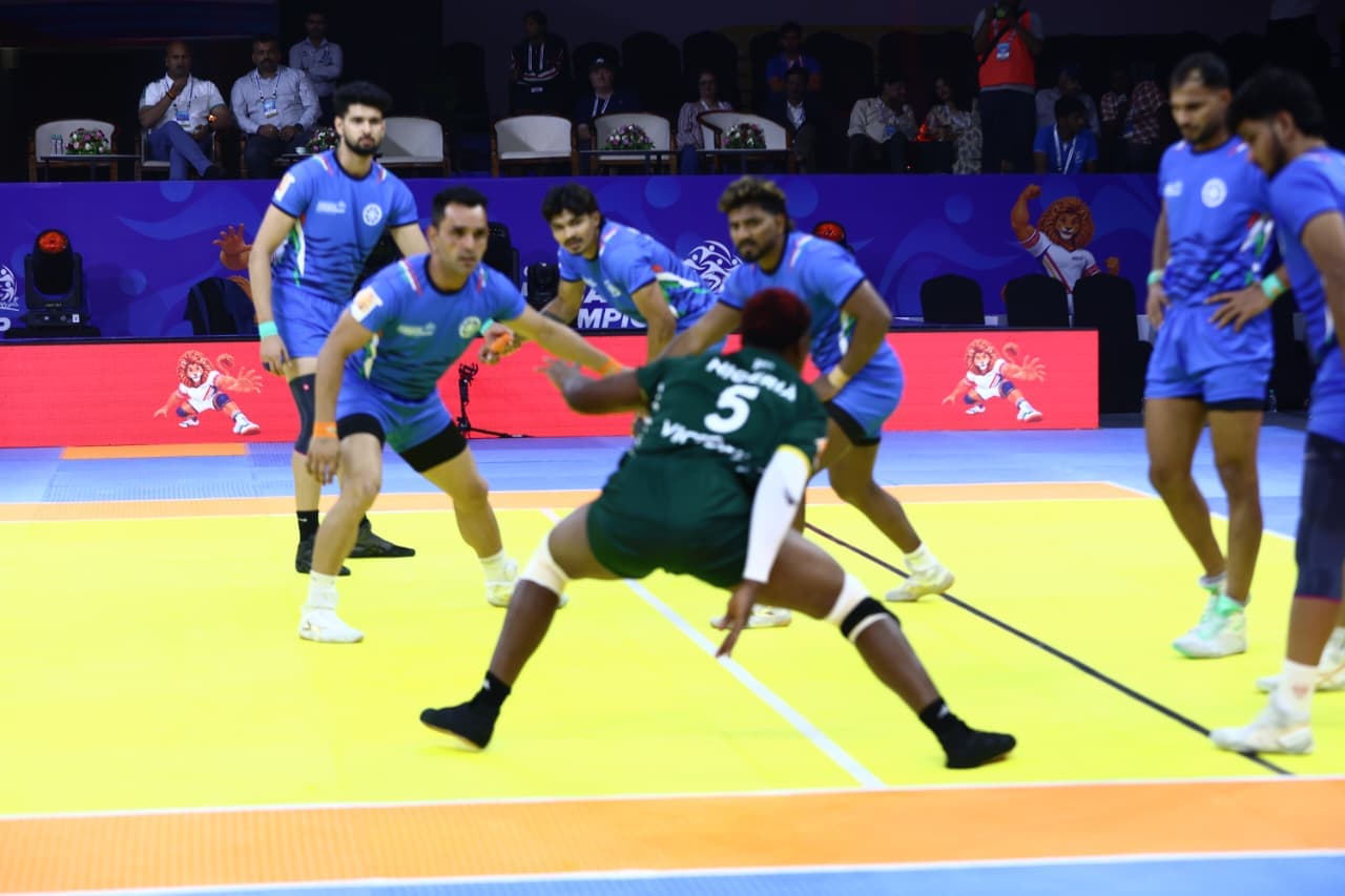 India's men line up against a Nigeria raider at the Commonwealth Kabaddi Championship