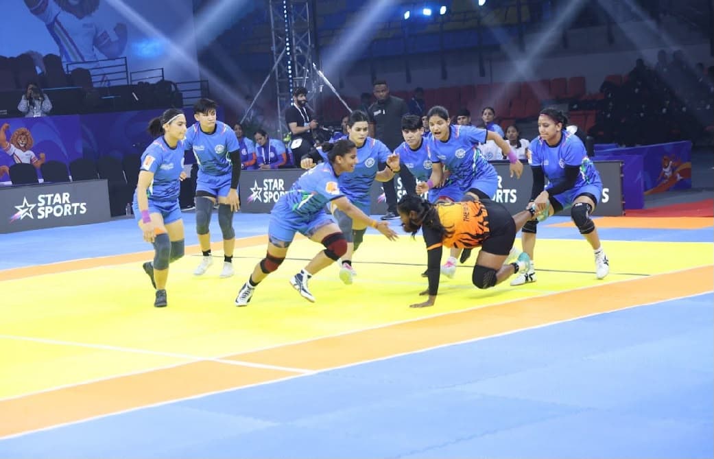 India's women tackle a Malaysia raider at the Commonwealth Kabaddi Championship