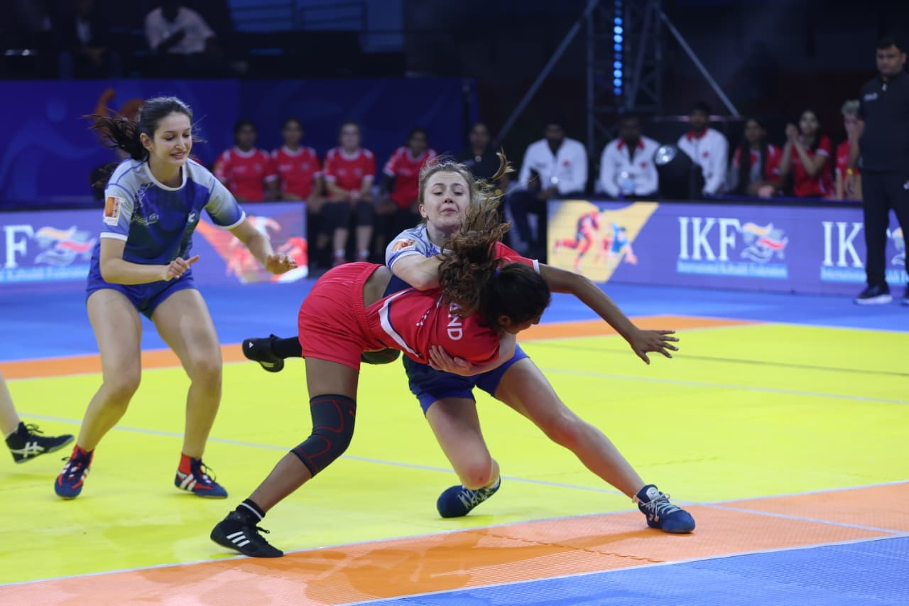 Scotland's women tackle an England raider in Ahmedabad
