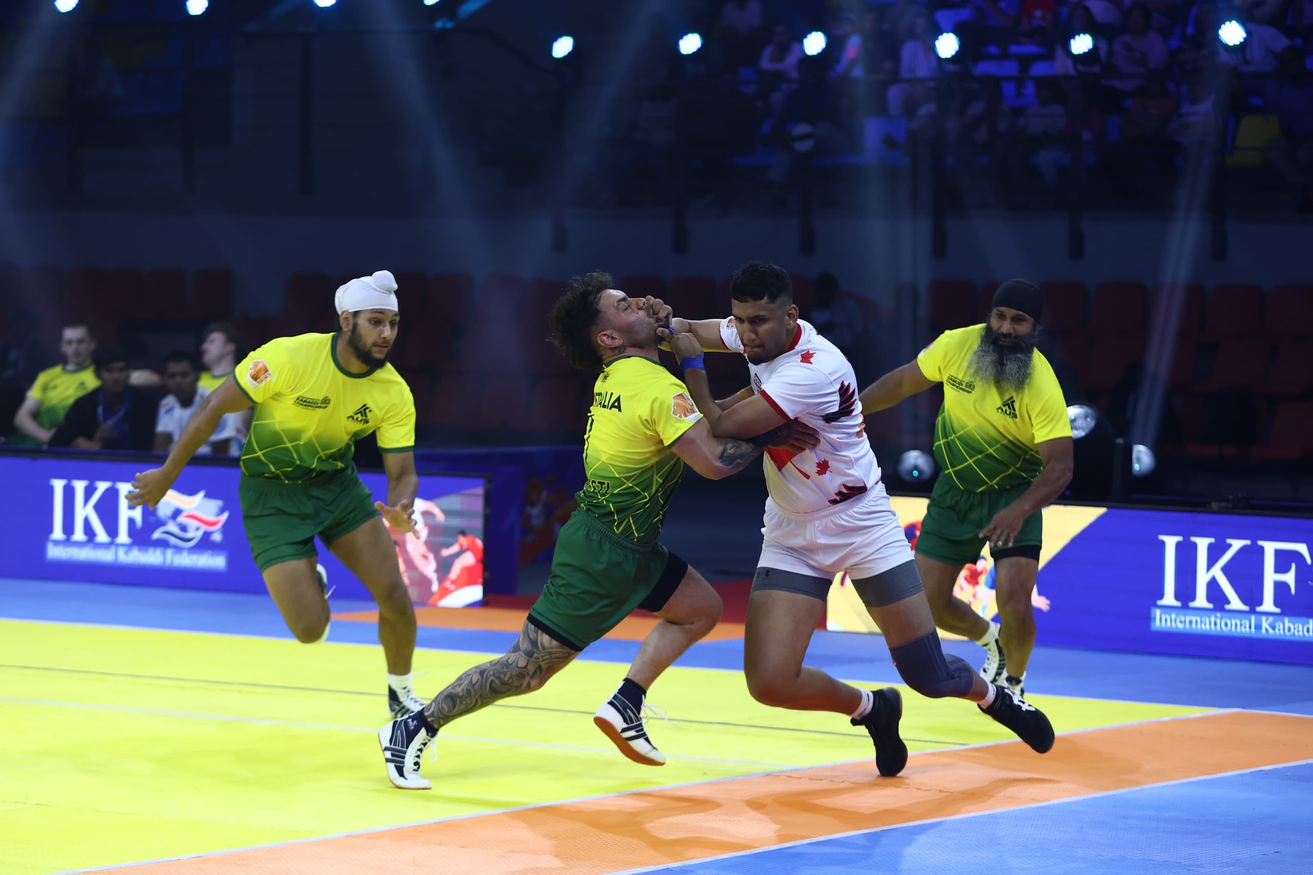 Canada and Australia grapple in the men's match at the Commonwealth Kabaddi Championship
