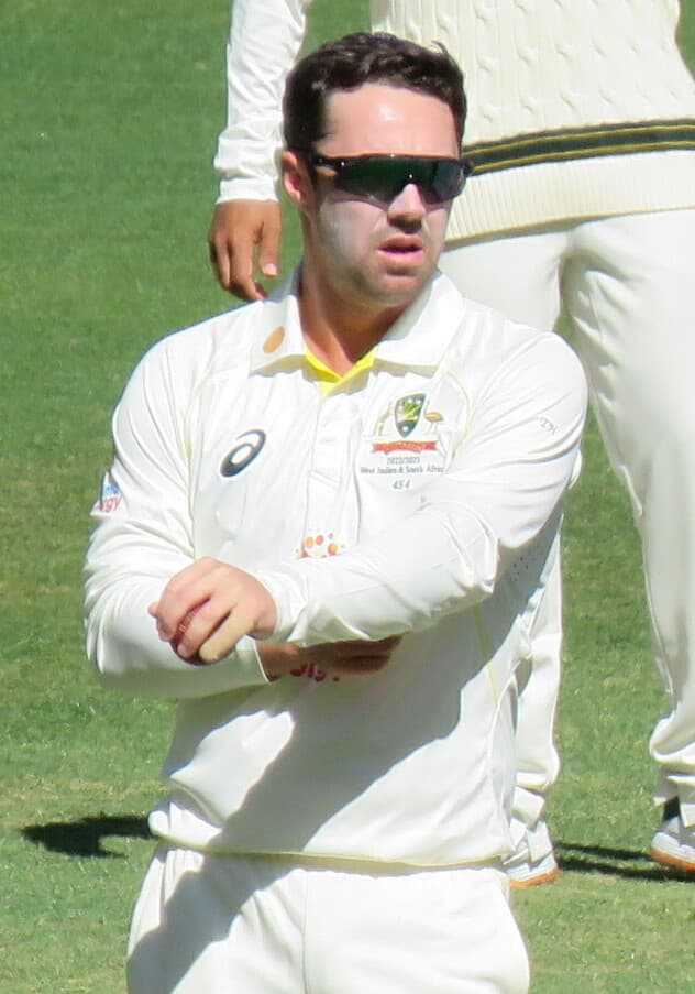 Travis Head bowling at Perth Stadium, First Test Australia versus West Indies, 2 December 2022. Head bowled one over, allowed four runs and took no wicket.
