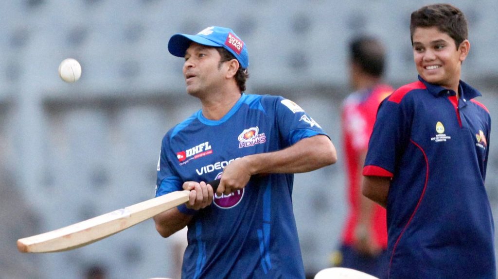 Arjun Tendulkar with Sachin.