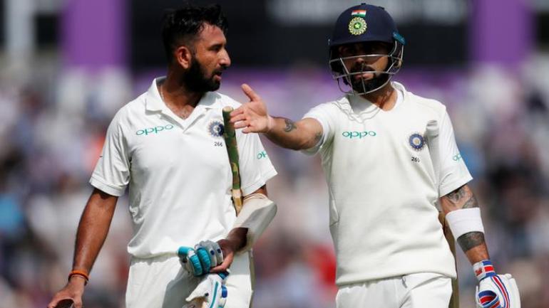 Cheteshwar Pujara and Virat Kohli