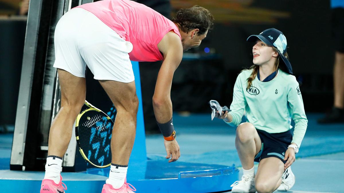 rafaei nadal hits ball girl