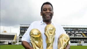 Pele with his 3 World cup trophies