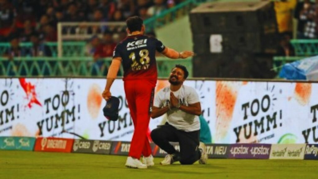 Watch: A fan Enters Lucknow Ground To Touch Virat Kohli's Feet, Stops IPL 2023 Match